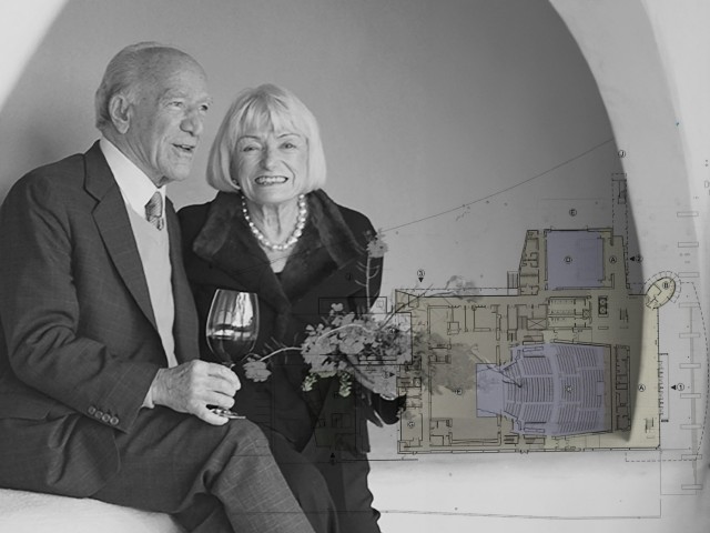 Elderly couple smiling together, holding a glass and a bouquet, with a faded architectural plan behind.