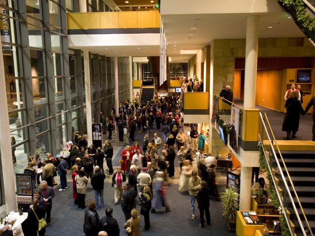 Lobby during showtime with audience members walking around