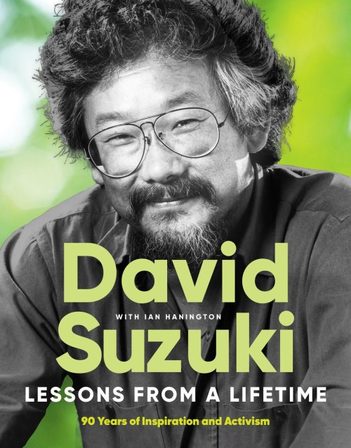 Book cover: Black-and-white portrait photograph of David Suzuki smiling against blurred green background.